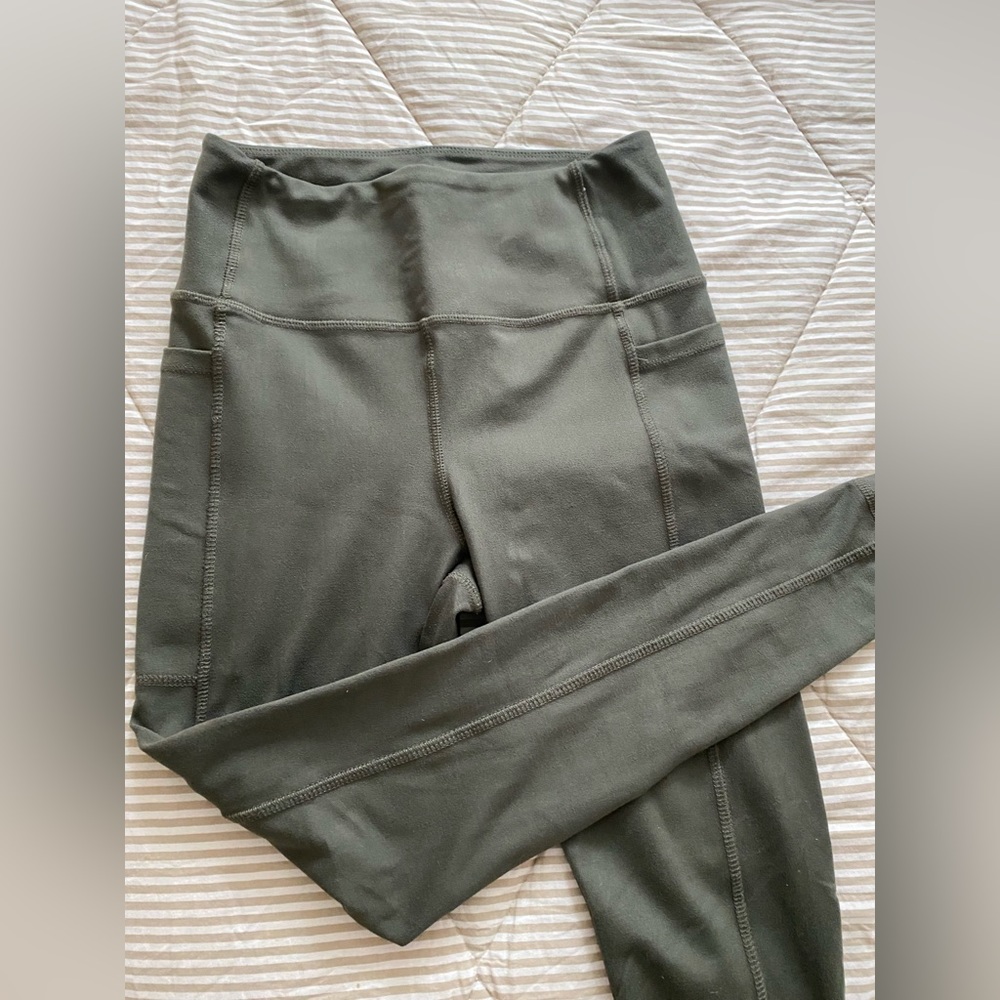 Green Danskin leggings, size S